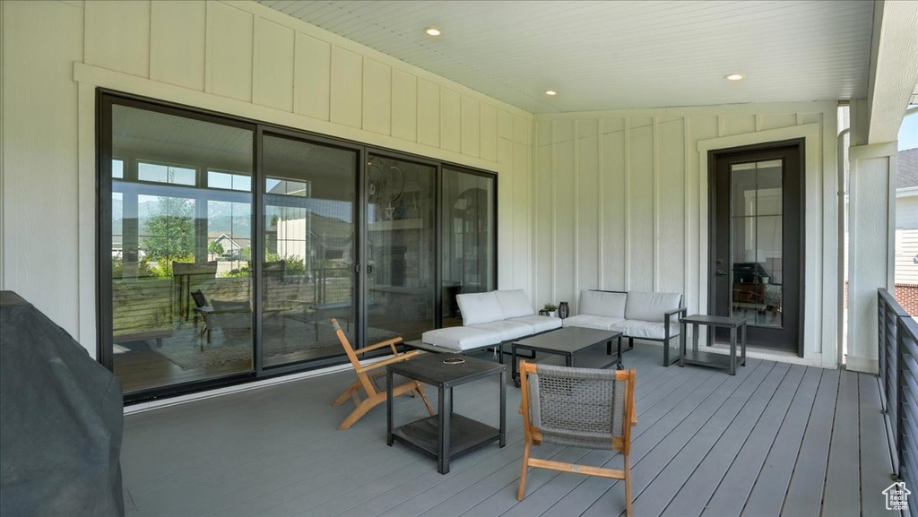 Wooden terrace with outdoor lounge area