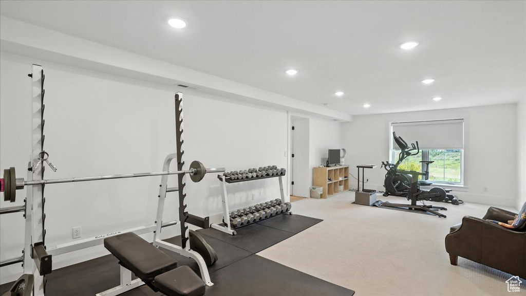 Workout area featuring recessed lighting and carpet floors