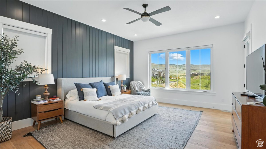 Bedroom featuring light wood-type flooring, recessed lighting, and a ceiling fan
