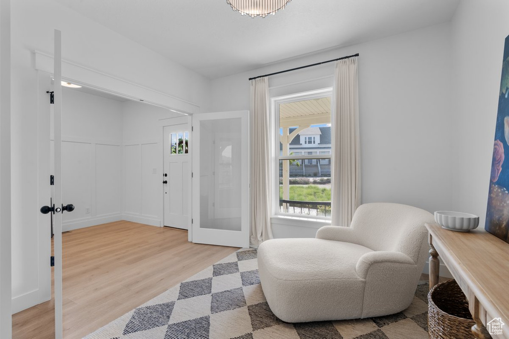 Living area with light wood finished floors