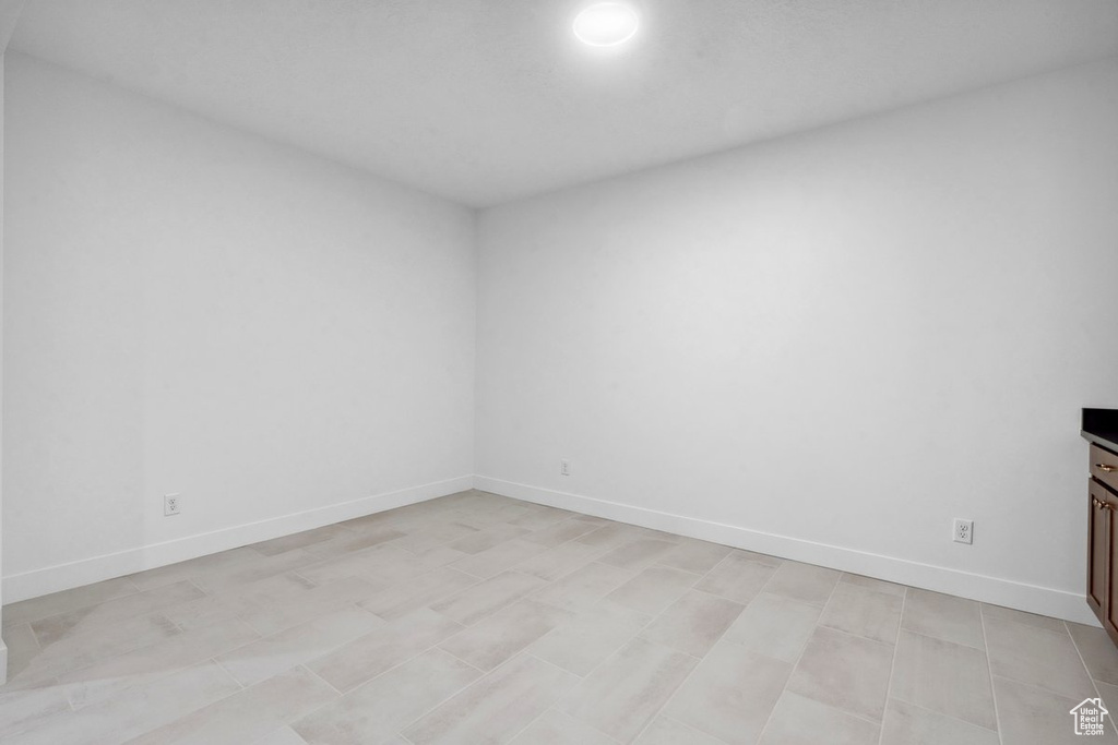 Spare room with baseboards
