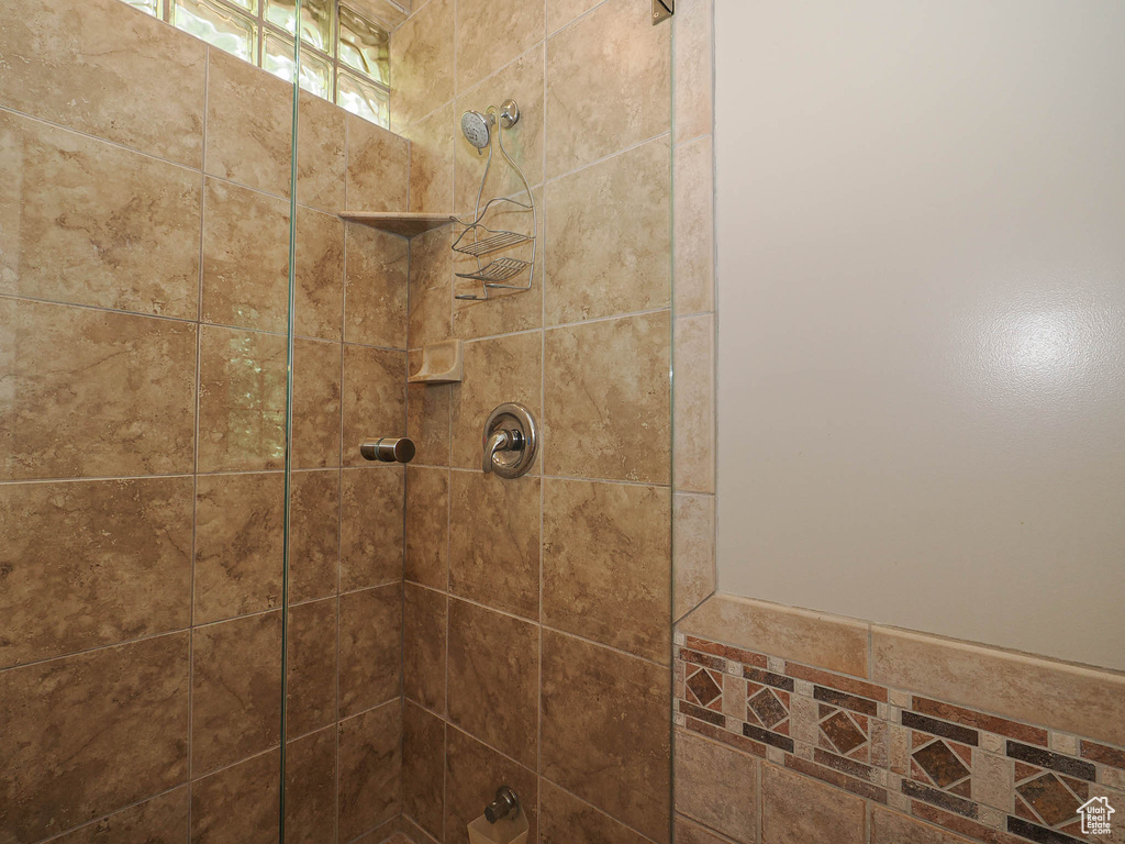 Bathroom with tiled shower