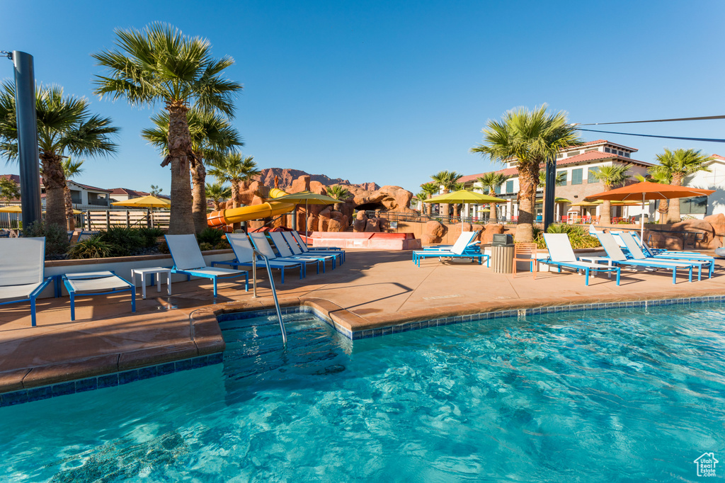 Community pool featuring a patio