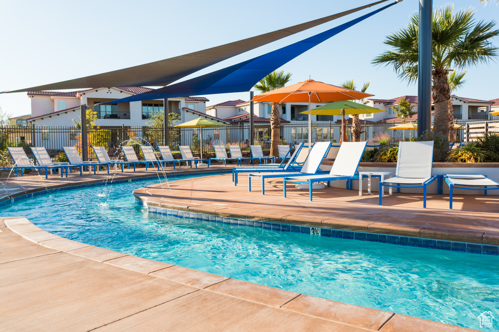 Community pool with a patio area