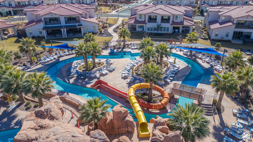 Aerial perspective of suburban area with a pool