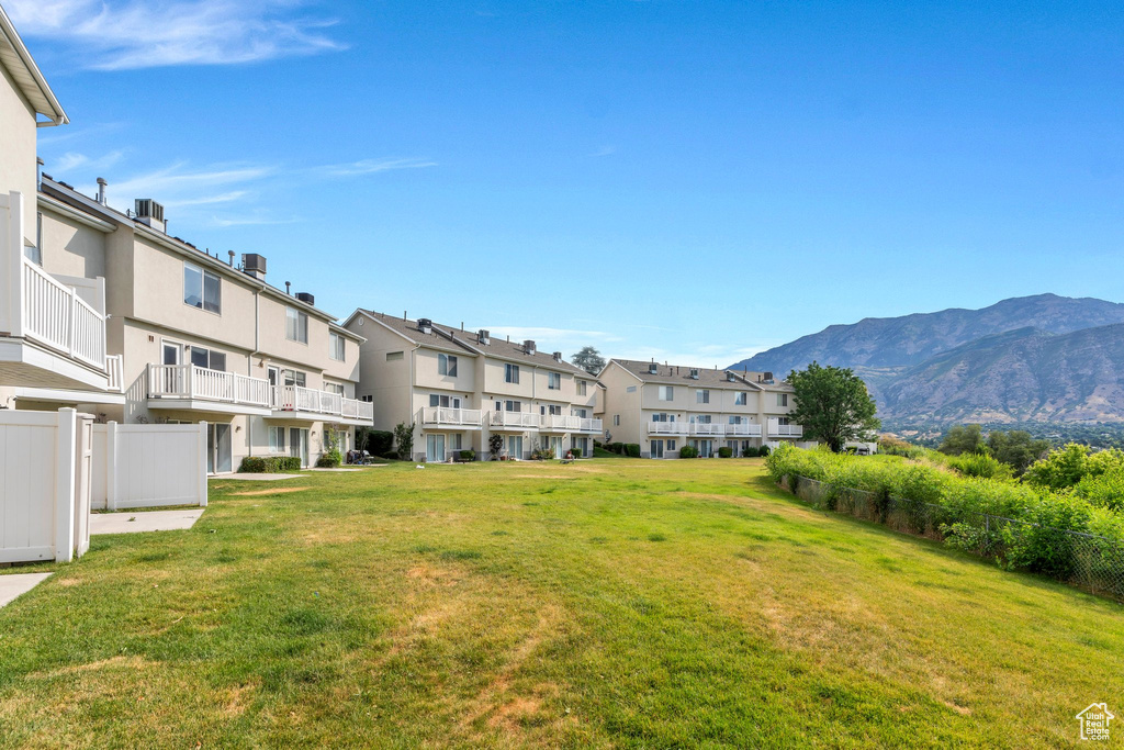 View of yard featuring a mountain view and a residential view