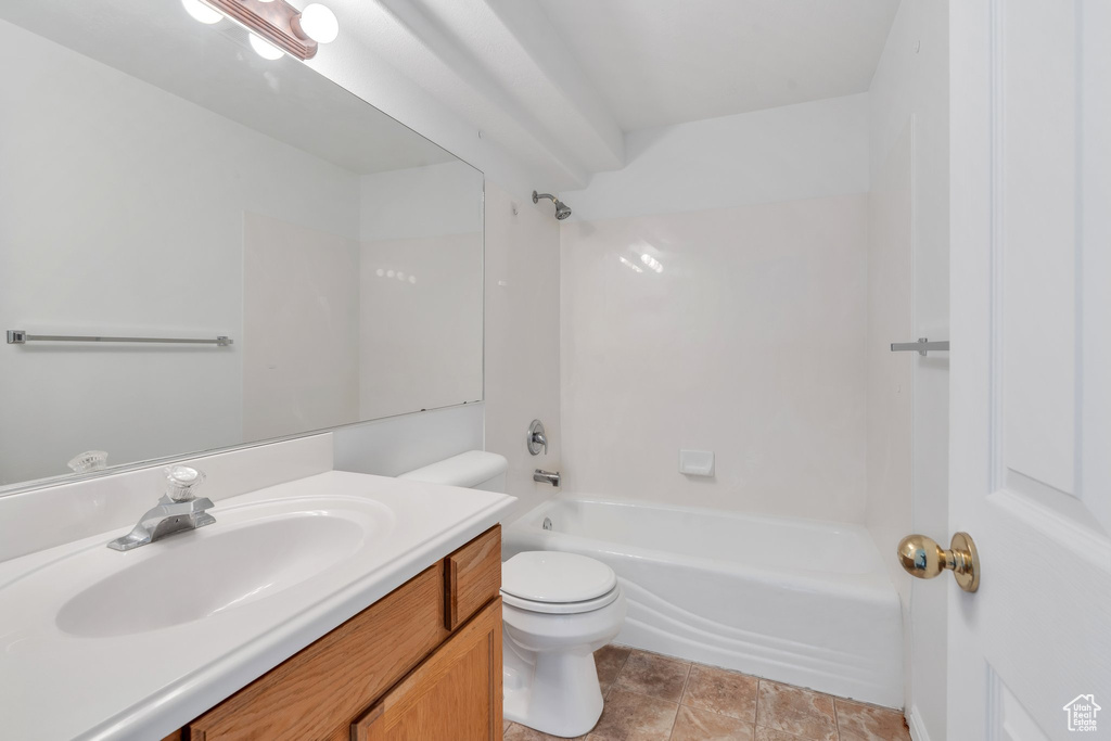 Full bathroom featuring vanity and  shower combination