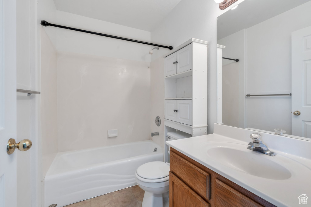 Full bathroom featuring vanity, shower / washtub combination, and tile patterned floors