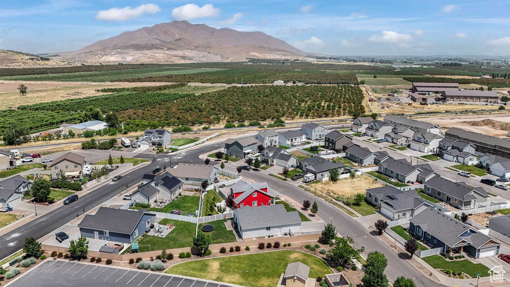 Aerial view of residential area featuring mountains