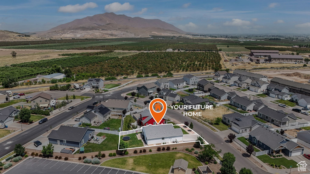Aerial view of residential area with mountains