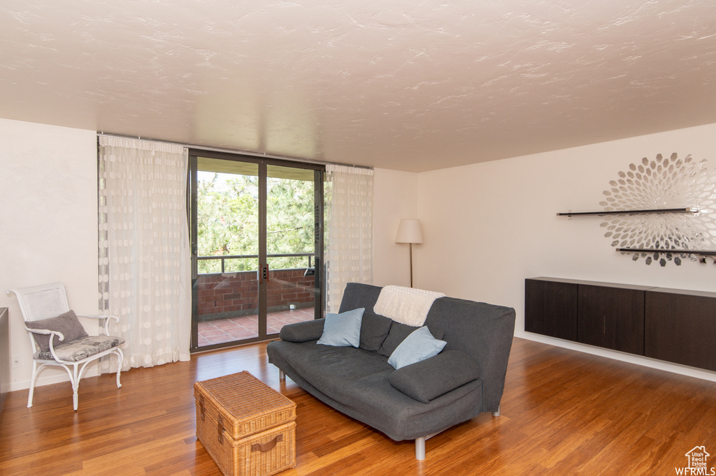 Sitting room with wood finished floors