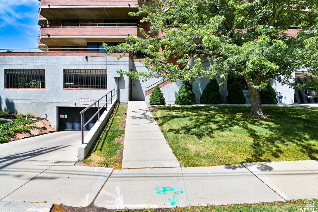 View of property featuring a garage