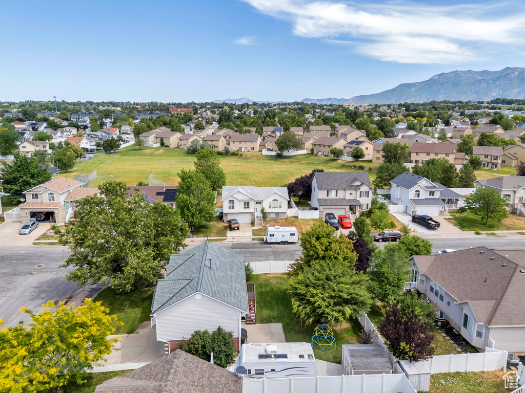 Aerial perspective of suburban area featuring mountains