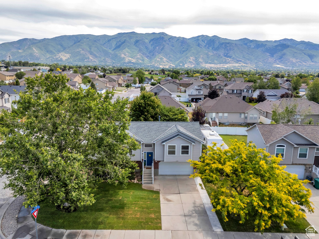 View of mountain backdrop with nearby suburban area