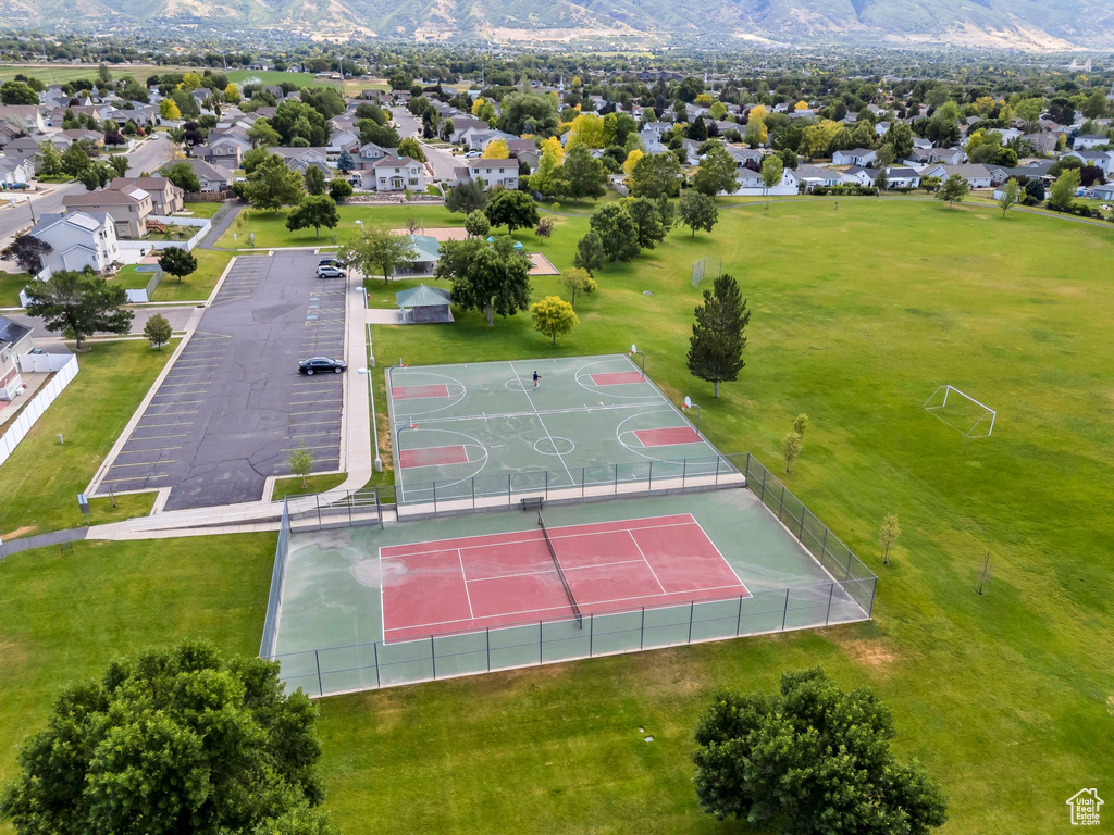 Aerial view of residential area featuring a mountain backdrop