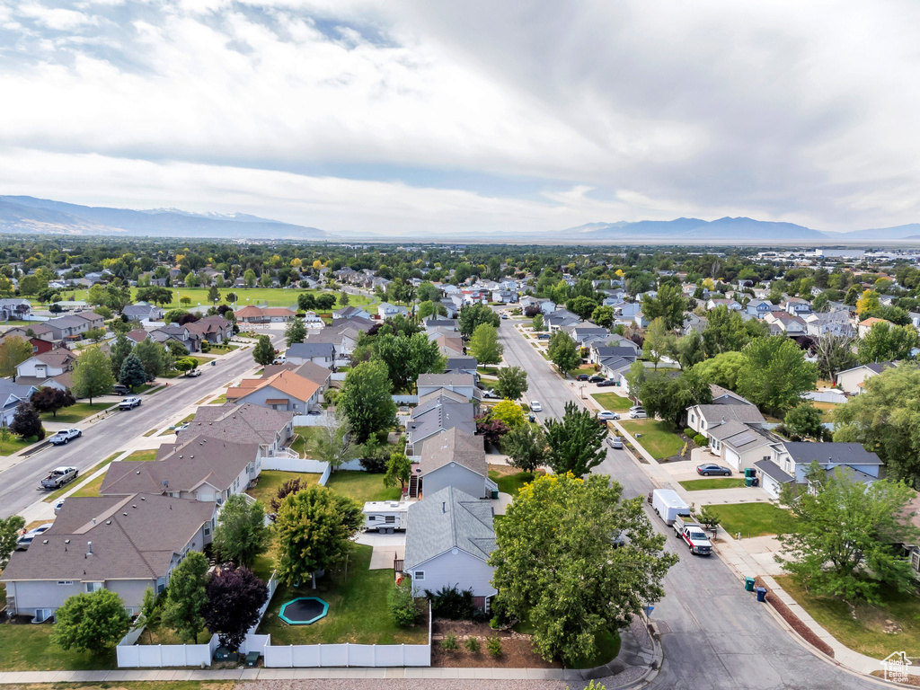 Aerial view of residential area with mountains