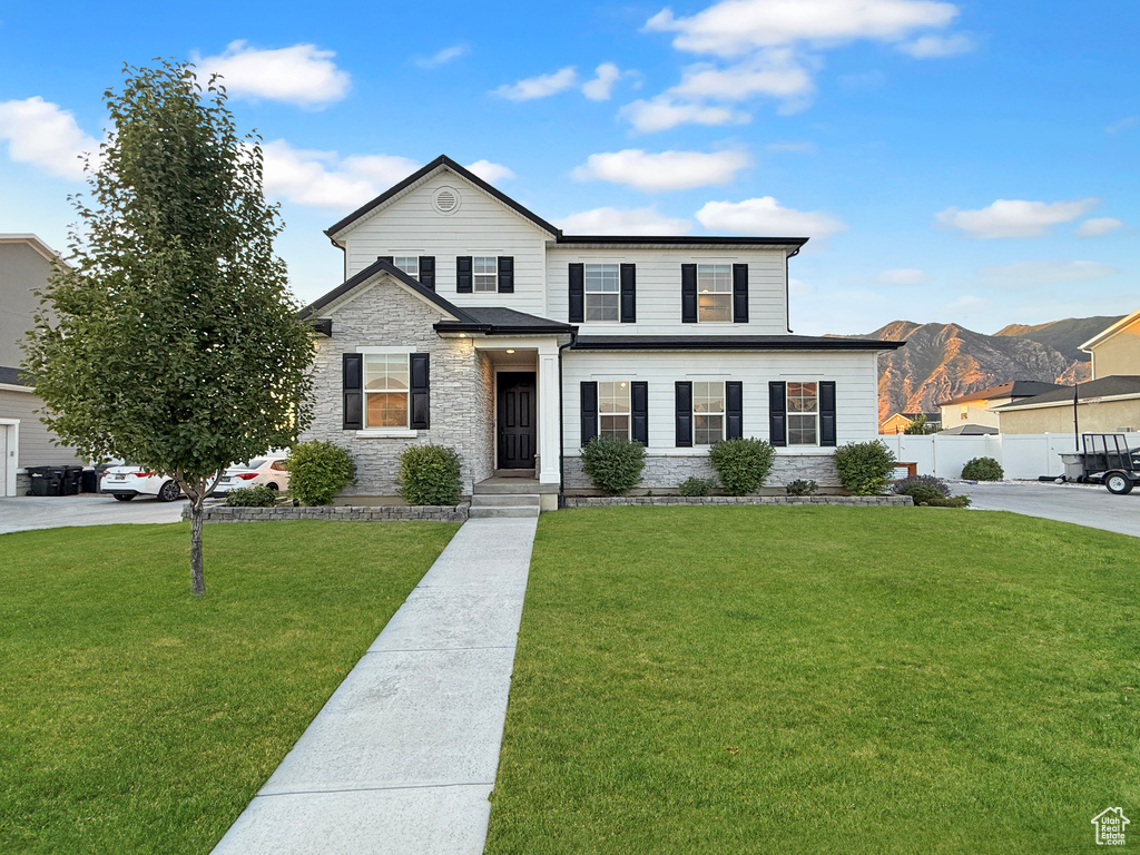 View of front of house featuring stone siding