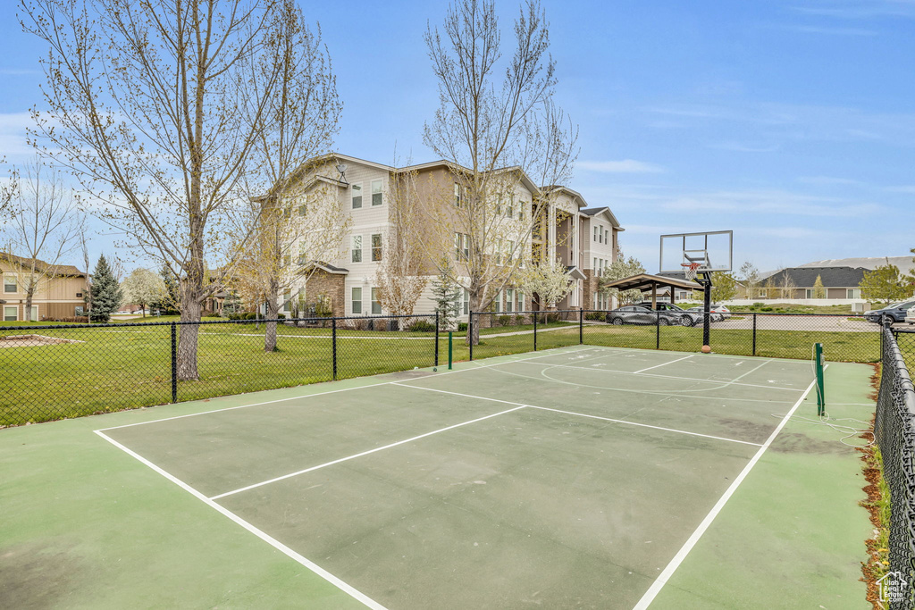 View of basketball court featuring community basketball court and a residential view