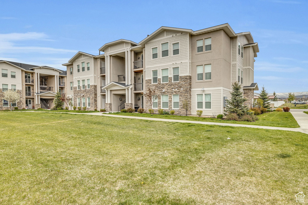 View of building exterior featuring a residential view