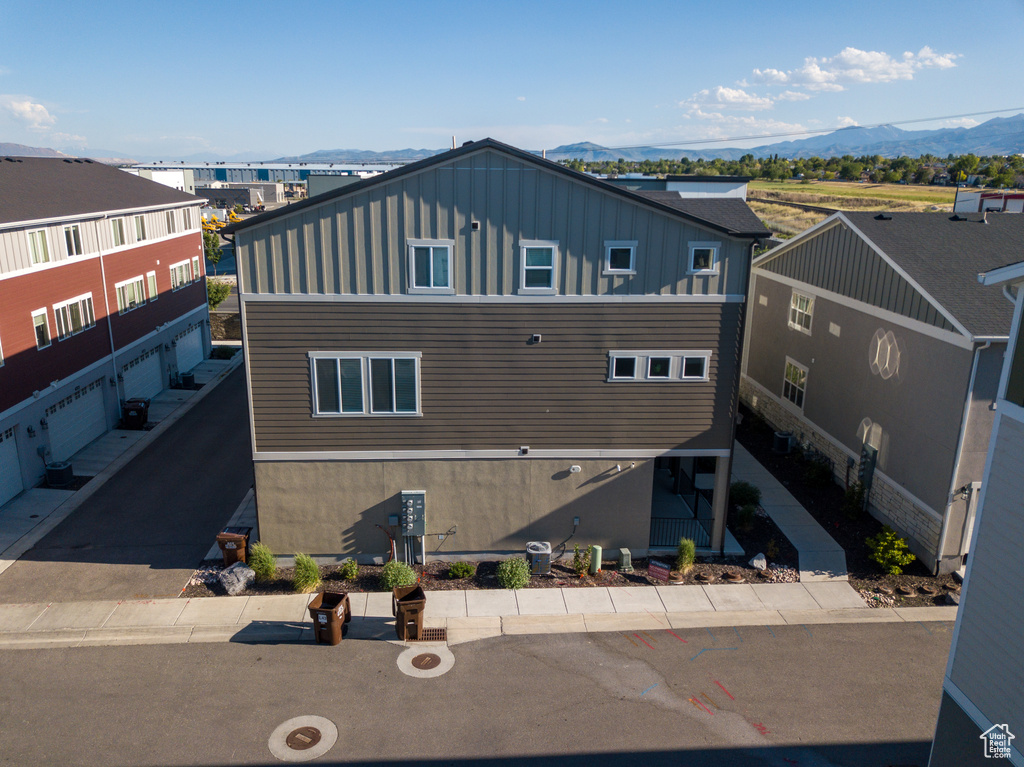 View from above of property featuring a mountainous background