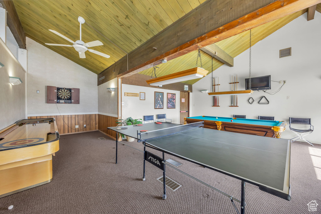 Game room featuring high vaulted ceiling, carpet, a ceiling fan, a wainscoted wall, and billiards