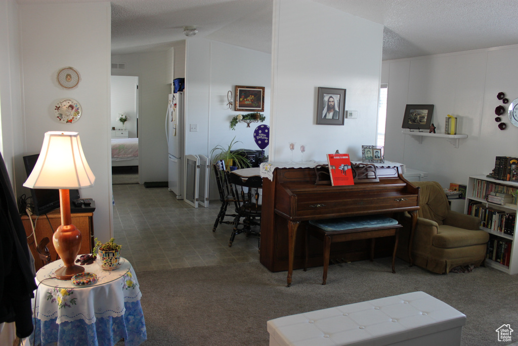 Living area featuring carpet floors