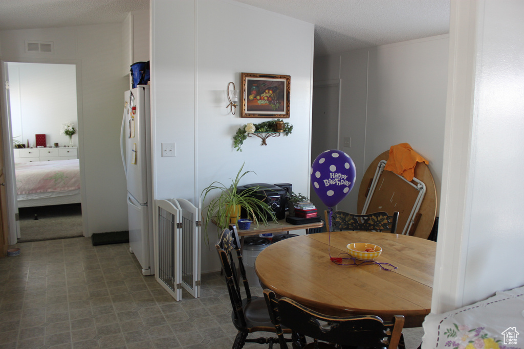 Dining area featuring tile patterned floors