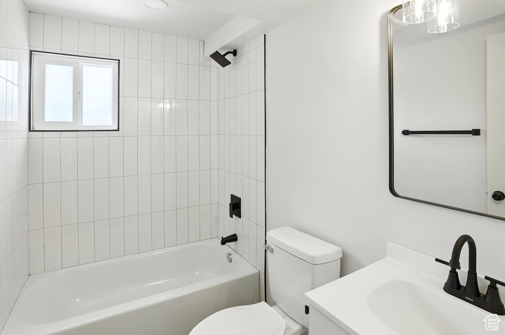 Full bathroom featuring vanity and  shower combination