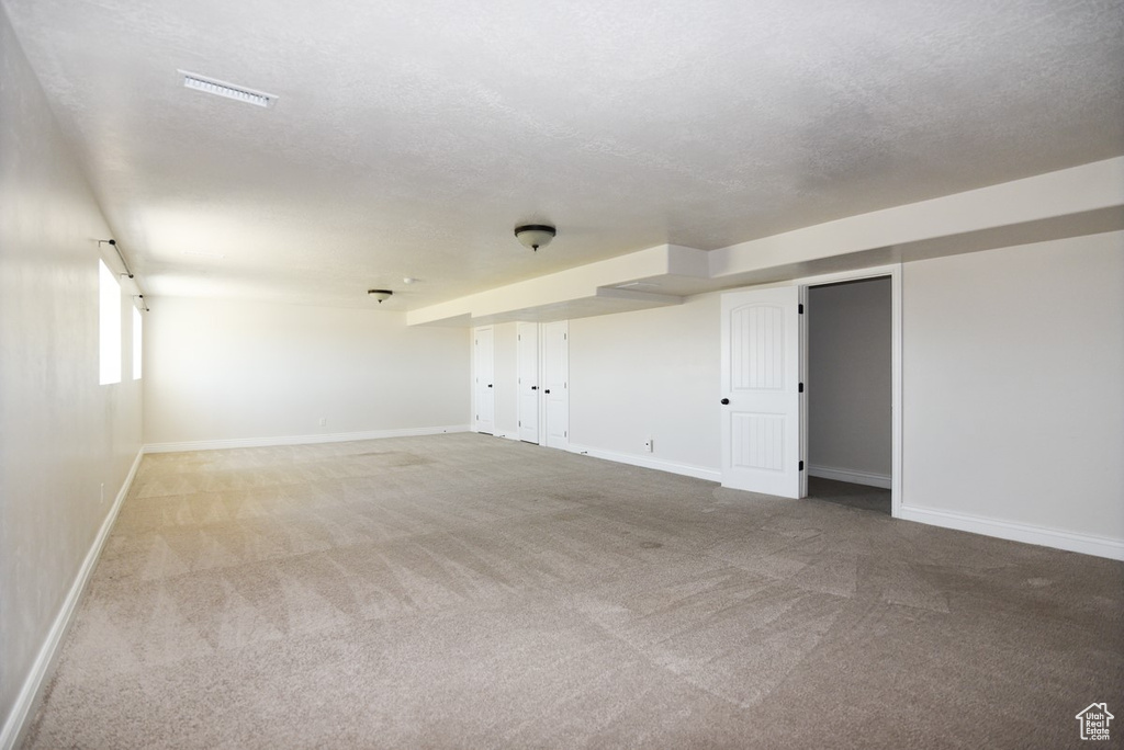 Spare room with carpet flooring and baseboards