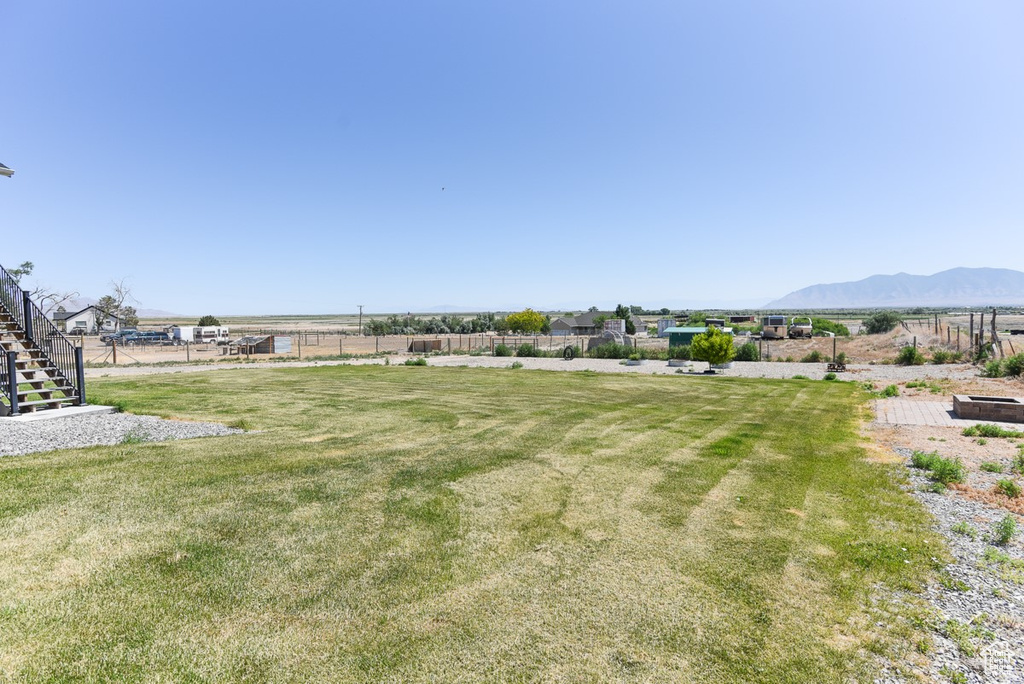 View of yard with a mountain view