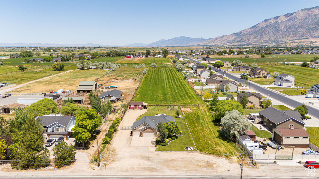 Aerial view of residential area with a mountainous background