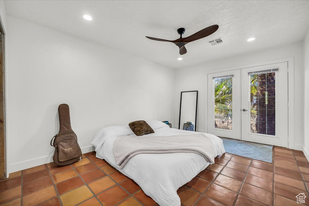 Bedroom with french doors, access to outside, recessed lighting, and a ceiling fan