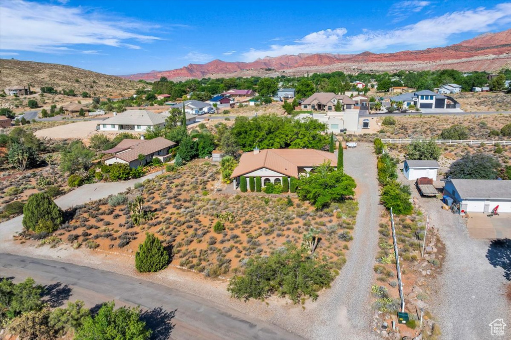 Aerial view of residential area with a mountain backdrop