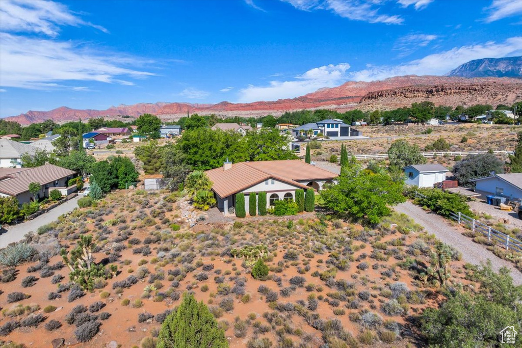 Aerial perspective of suburban area with mountains