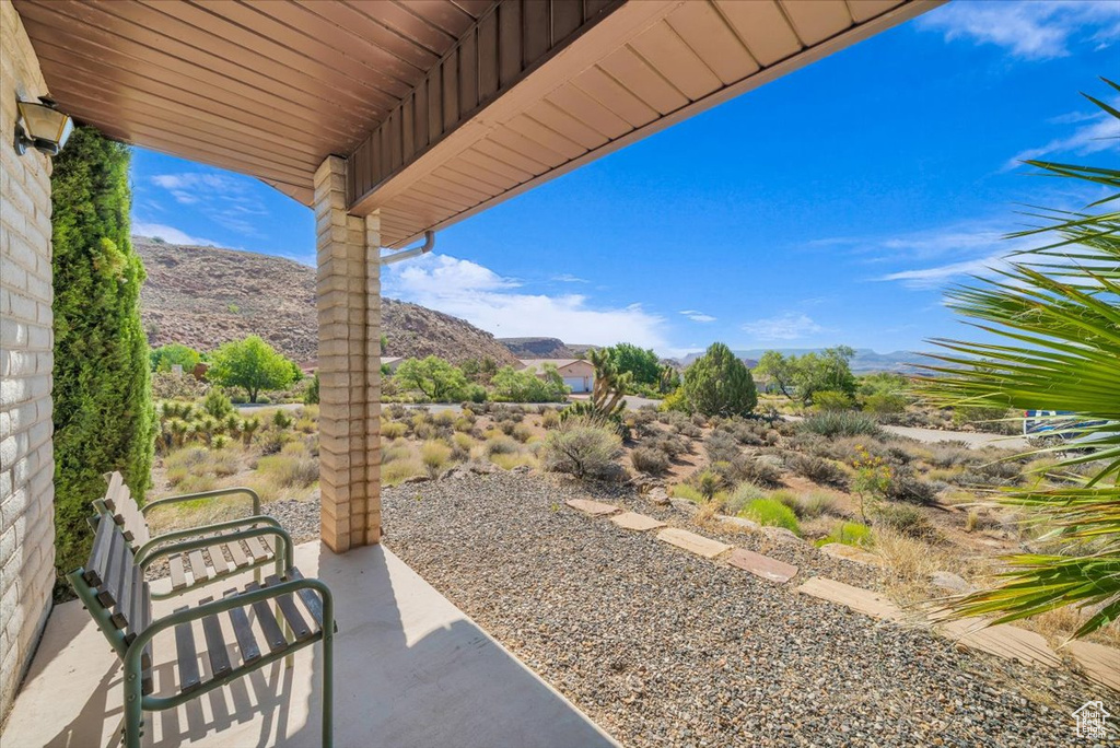 View of patio with a mountain view