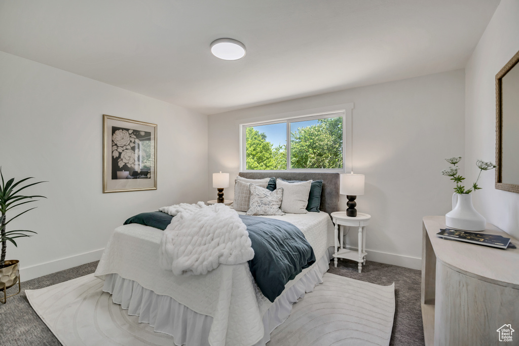 Bedroom featuring carpet