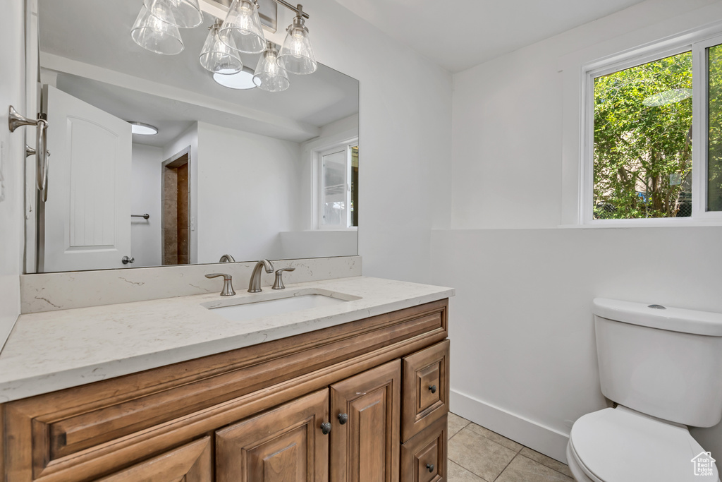 Bathroom featuring vanity and tile patterned flooring