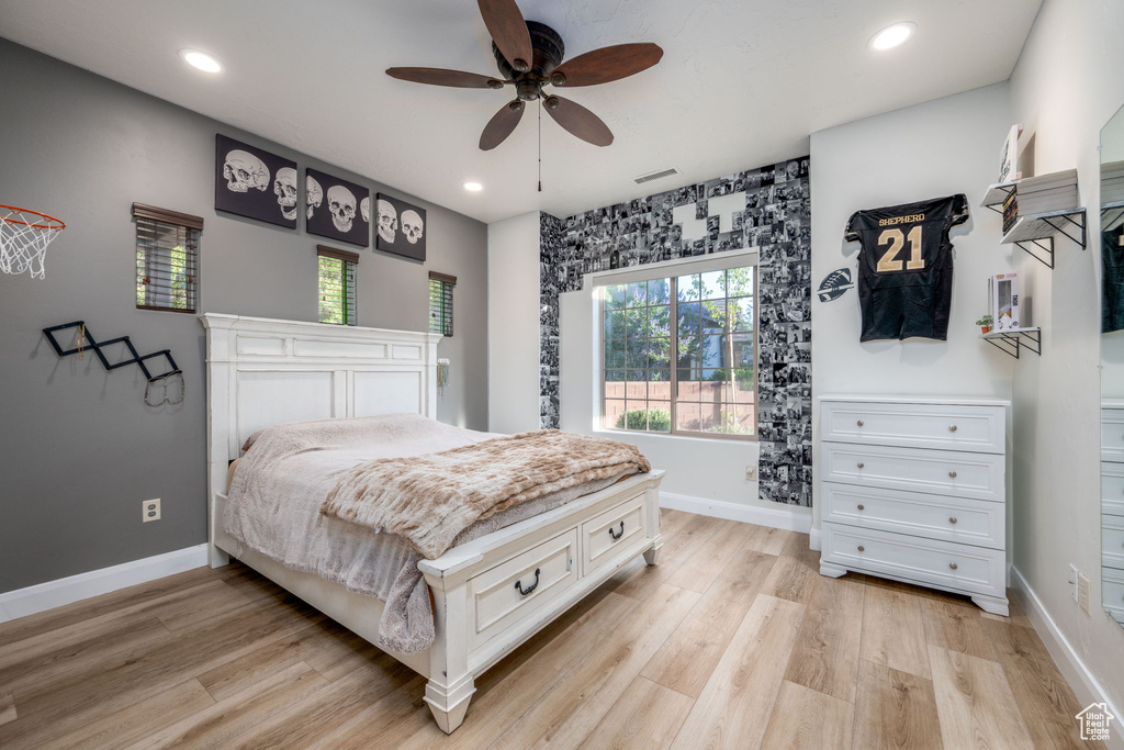 Bedroom with recessed lighting, light wood-style flooring, and ceiling fan