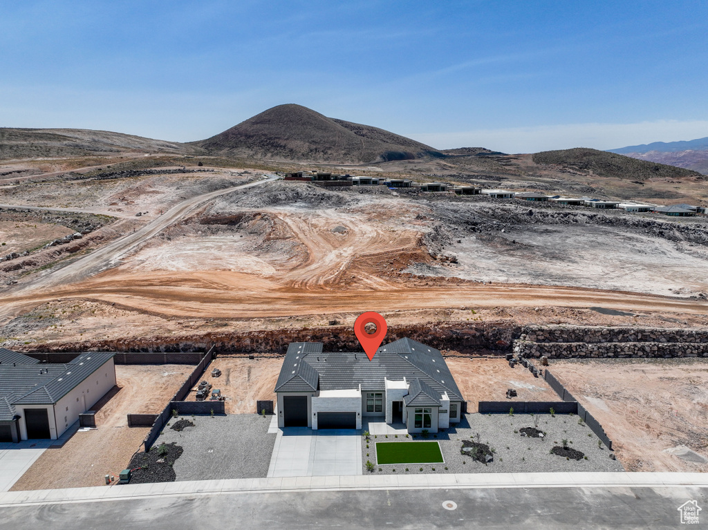 View from above of property with a mountainous background