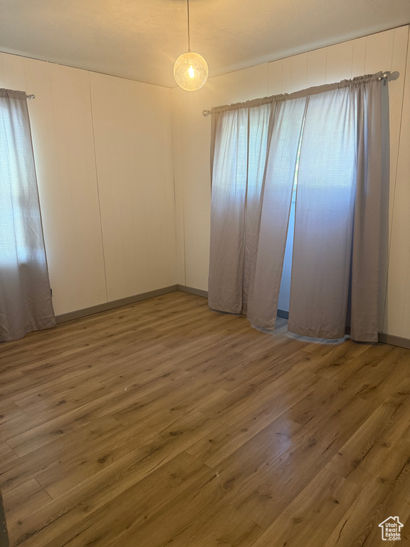 Unfurnished room featuring wood finished floors