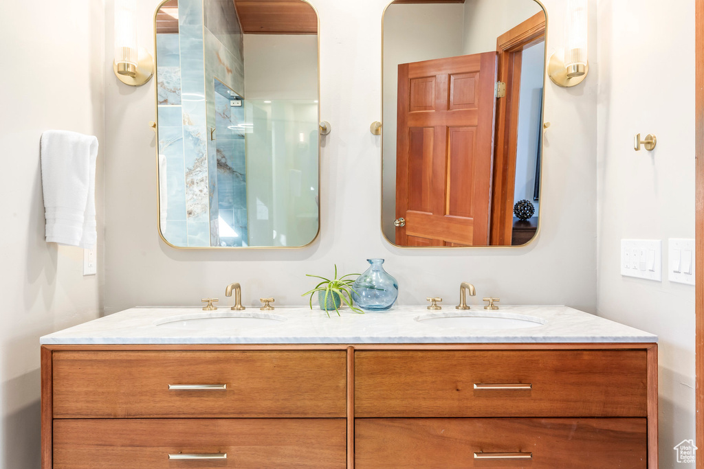 Bathroom featuring double vanity