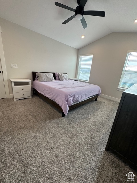 Bedroom with vaulted ceiling, carpet, recessed lighting, and a ceiling fan
