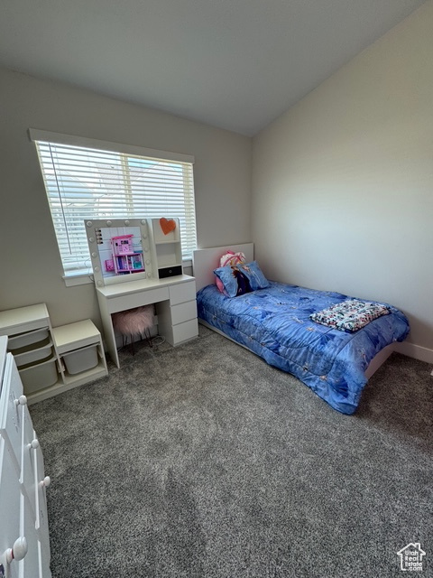 Bedroom featuring carpet flooring