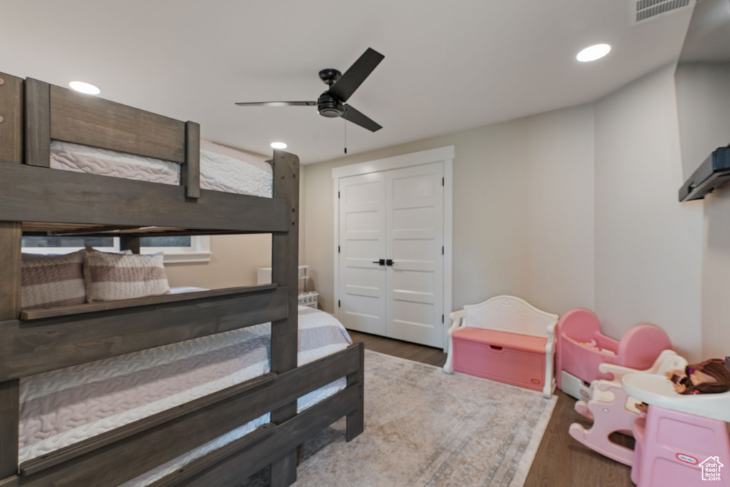 Bedroom featuring wood finished floors, recessed lighting, and ceiling fan