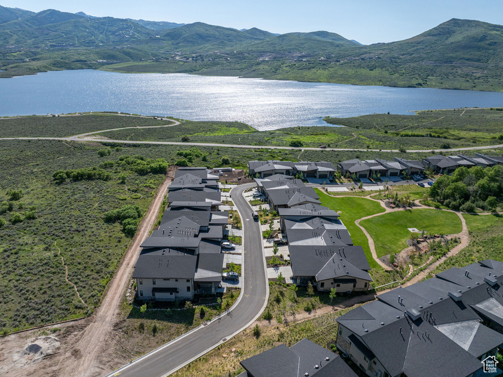 Aerial view of residential area with a water and mountain view
