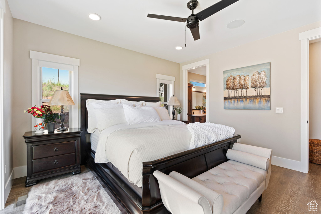 Bedroom featuring light wood-style flooring, a ceiling fan, and recessed lighting