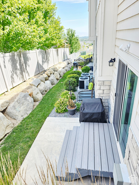 Fenced backyard featuring a patio
