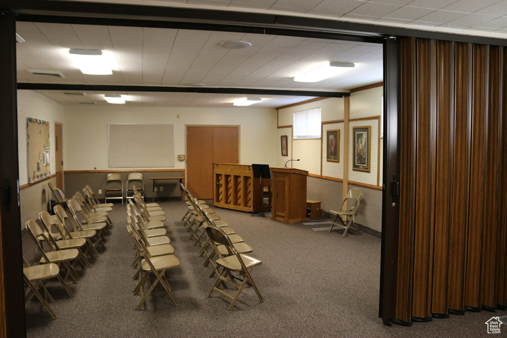 Miscellaneous room with carpet flooring