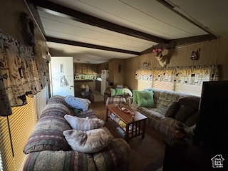 Living room with beamed ceiling