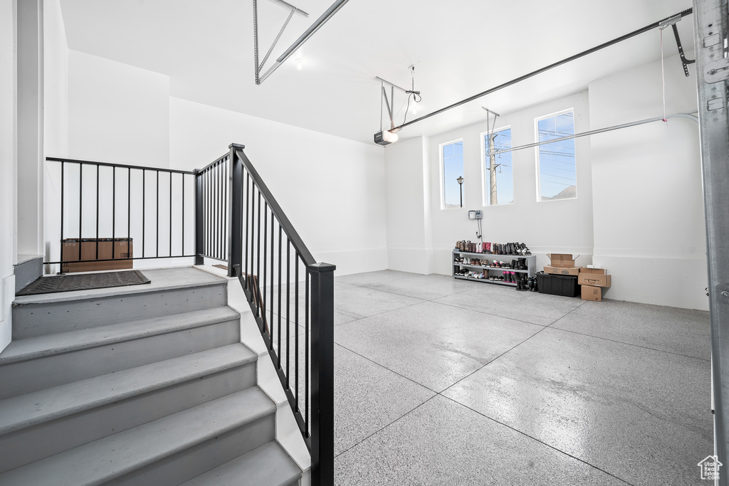 Garage featuring a garage door opener
